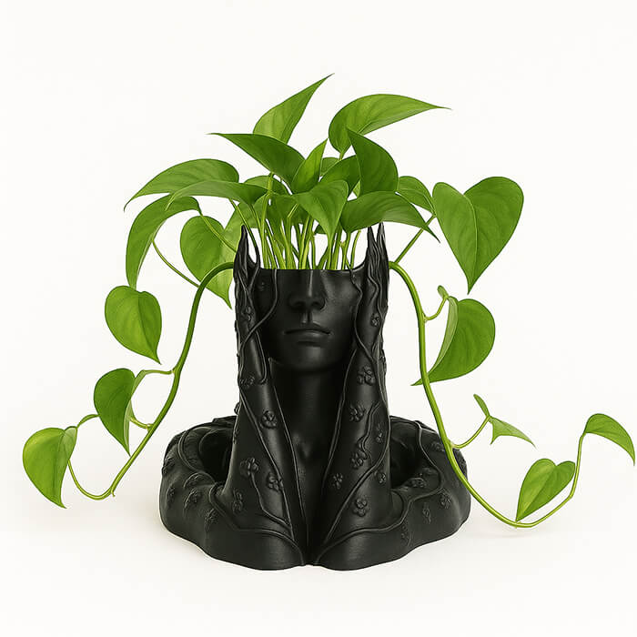Black woman sculpture 3D printed PLA planter with flowing botanical vines, artistic face design holding green pothos plant, modern decorative piece by Plantale.